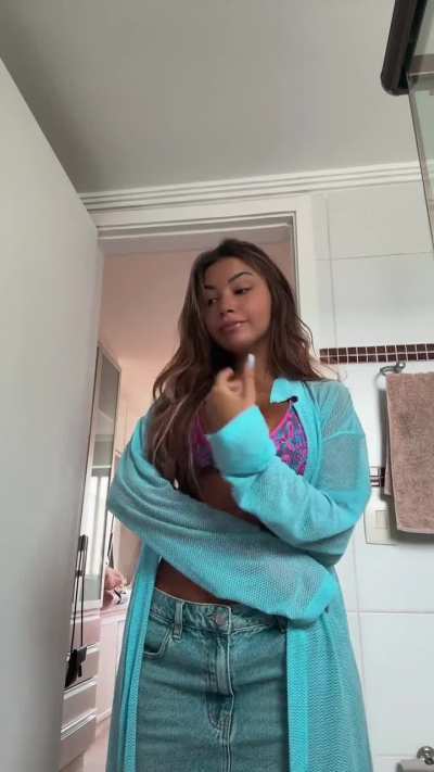 Bikini top and denim skirt Via Tiktok December 2025