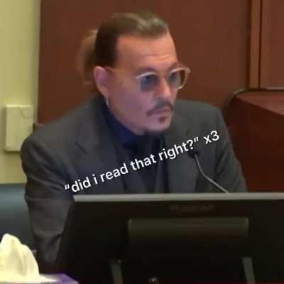 Johnny Deep dealing with Amber's lawyer.