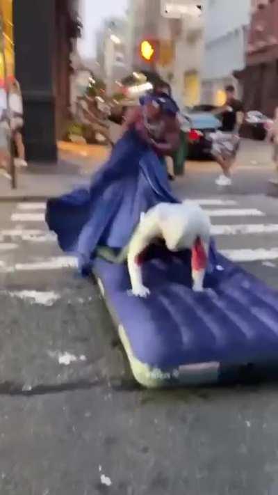 Bro is really doing this in the middle of the street SMH.