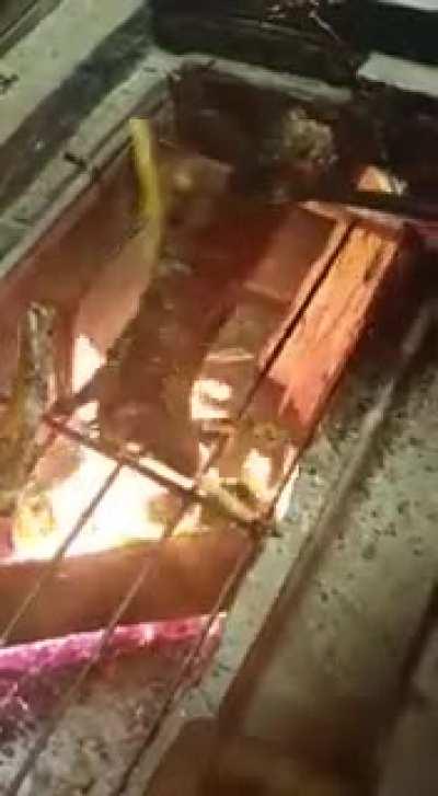 WCGW barbecuing on a grate with massive holes