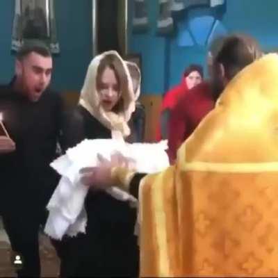 Leaning on someone while holding a candle