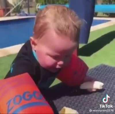 Trying to eat a banana