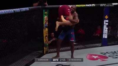 Derek Brunson lifts and slams Elias Theodorou
