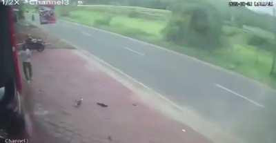 Passenger goes airborne from a car/scooter head-on