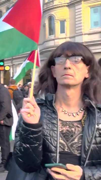 A trans lady quietly attended a pro Palestinian rally waving a Palestinian flag. It's made a lot of right wing Zionists very angry so I wanted to share her here. This is a moment that binds all of us. None of us are free until all of us are free.
