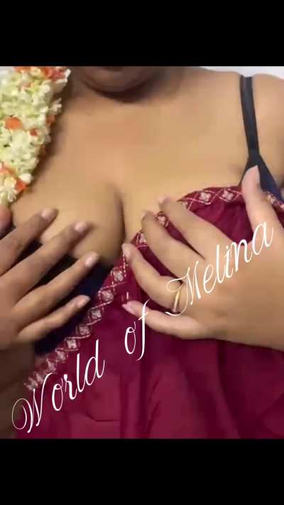 Melina strips the tradition away — jasmine off, bra on full display