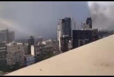 This angle of the explosion in Beirut shows the shockwave shattering all the glass from buildings