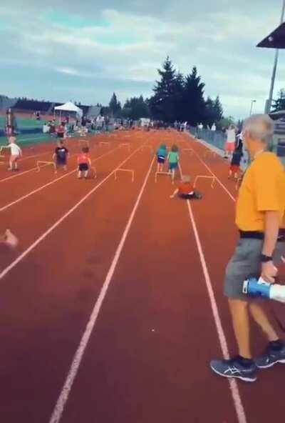 Kids hurdle race. Focus on a different kid everytime.