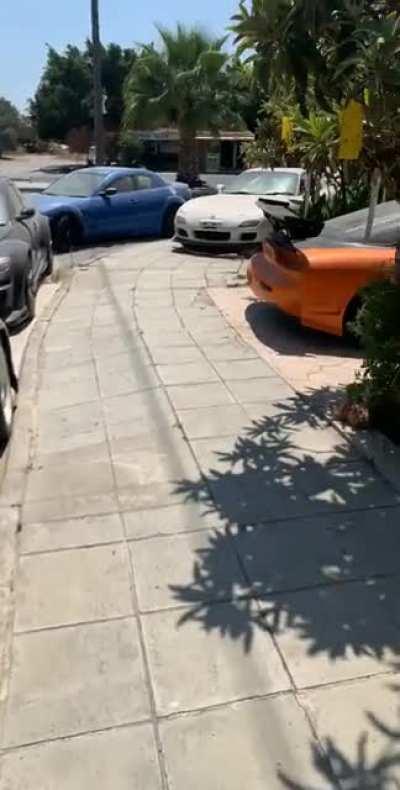 Pile up of old rotaries outside someone’s house in Cyprus