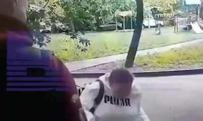 Using a starter pistol against someone's head.