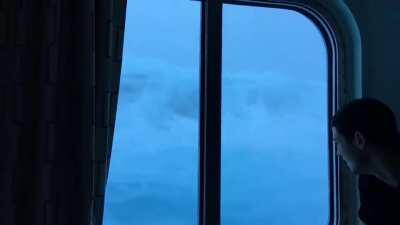 A Cruise ship caught in huge waves and 120MPH winds. View from the third deck.