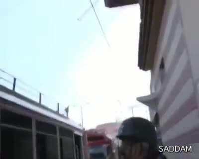 Pakistani Journalist losing his shit after being stuck in a firefight going on between Pakistani Mafia style gangs and The police. 2010, Lyari.