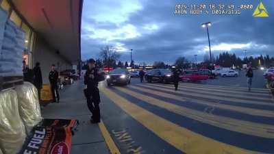 Cop stops a guy for alleged shoplifting, he proves his innocence by walking through the store beeper showing nothing, but the officer still tries to arrest him, his fellow cops body slam him on the pavement, then drop all charges and let him go.