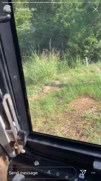 2chainz driving the Jesus tank