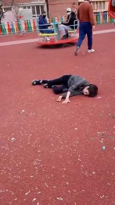 Crazed father throws a boy who was bullying his son to the ground.