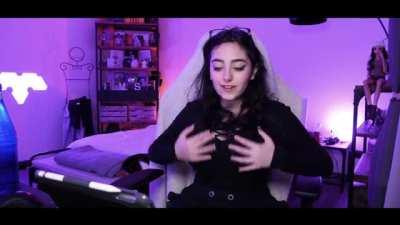 Adjusting her huge tits