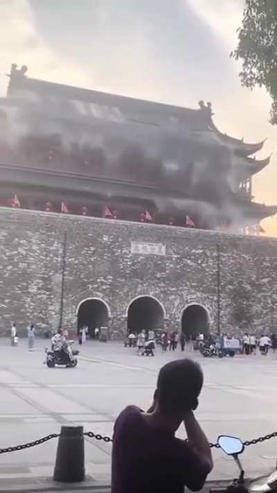 The roof of a 650-year-old drum tower in Anhui, China, collapses.
