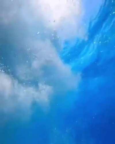 Cliff jumping into the crystal blue Mediterranean Sea