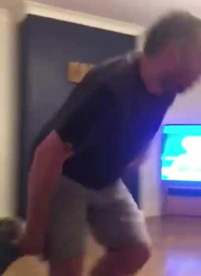 Playing keepie uppie with a toilet roll.