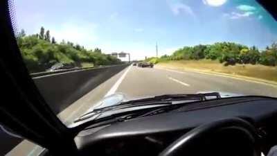 Porsche avoids high speed crash