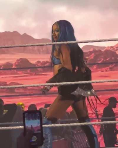 Seductively taking off her jacket