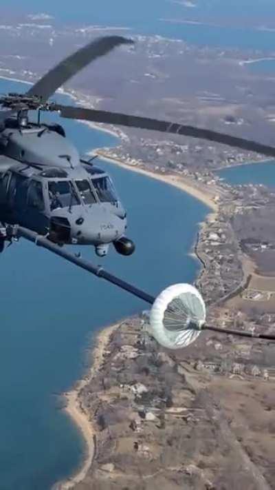 Helicopter Air-to-Air Refueling.