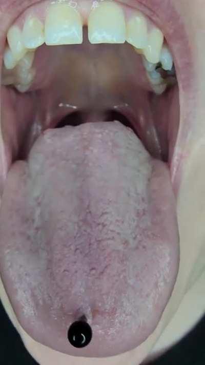 A glimpse of morning breath uvula.