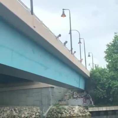 Not letting go while swingin’ off a bridge