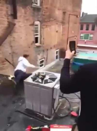 Hitting bottles from the rooftop