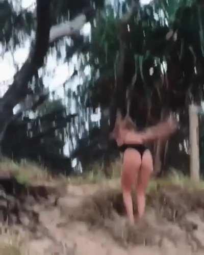 Trying to do a back-flip at the beach