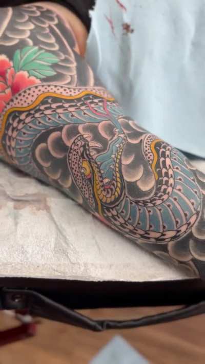 Snake and peonies n progress. By Andrew Edlin in Spokane Wa