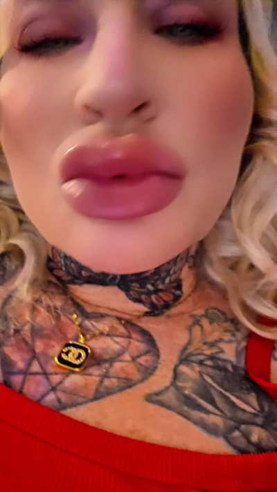 I’m laying here… slowly waking up, hair still curled, lips glossy, tank top soft against my skin. I catch you watching. So I take my time. I let my tongue trace my lips, just once… not for you — but knowing you’ll notice. I like that moment when curiosity