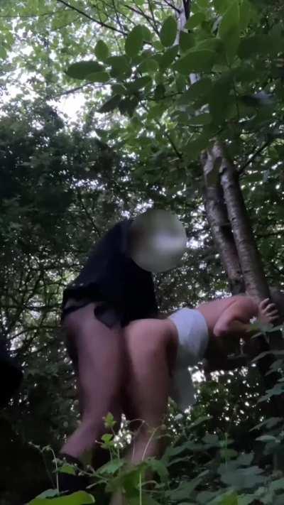 We were meant to be walking from the bar to the hotel (where my husband was waiting) but he took me on a detour. It was still light and quite risky but we found a partial clearing, he bent me over and I took him deep....The fact that my husband was waitin