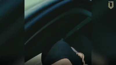 Territorial Defense fighters show off what they did with a captured and partially destroyed Grad launcher