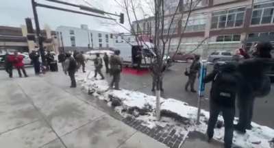 Federal agents caught imbedding their selves within protesters after one is extracted by agents in a white van