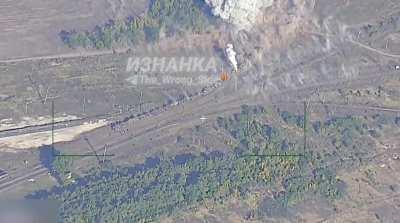 RU POV: Ukrainian train carrying military vehicles struck by Russian munitions
