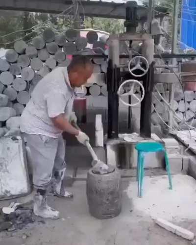 These guys carving a block of stone