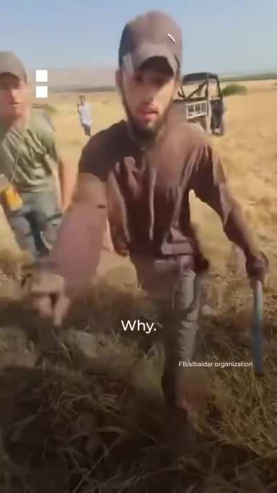 A Palestinian Farmer getting attacked by Israeli colonizers over his land
