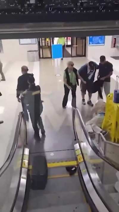 Escalator fight at airport