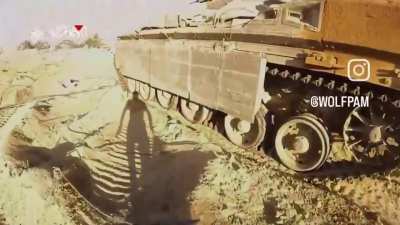 Hamas sets a shaped charge inside an IDF IFV