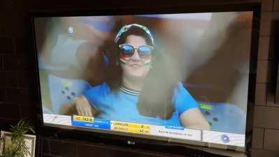 8 year old me stuffing candies in mouth while mom is watching.