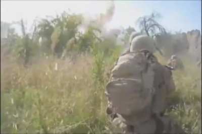 US Marines observe the close impact of airstrikes, when the Corpsman gets hit by shrapnel. Afghanistan, End. Freedom.