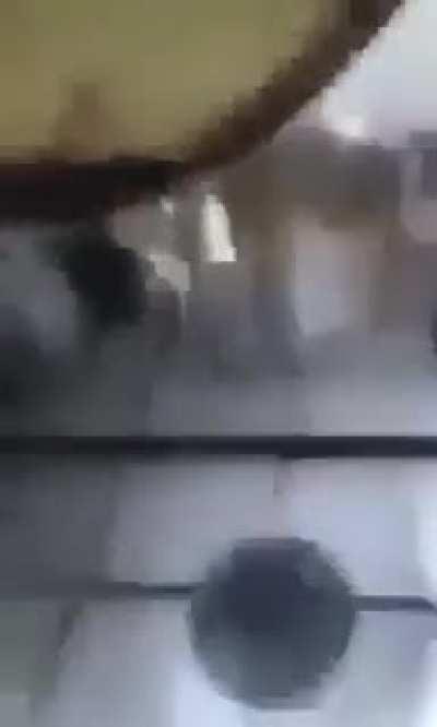 polish kid trying to make pancakes