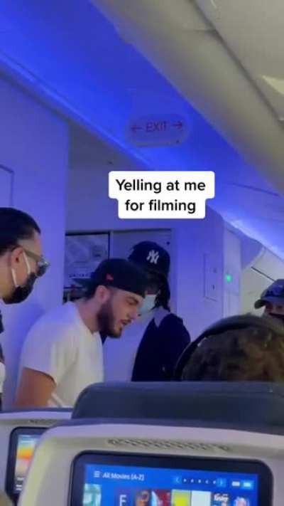 Threatening passenger on a commercial airplane.