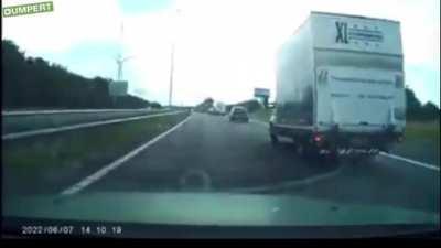 Idiot cuts off other idiot switching lanes