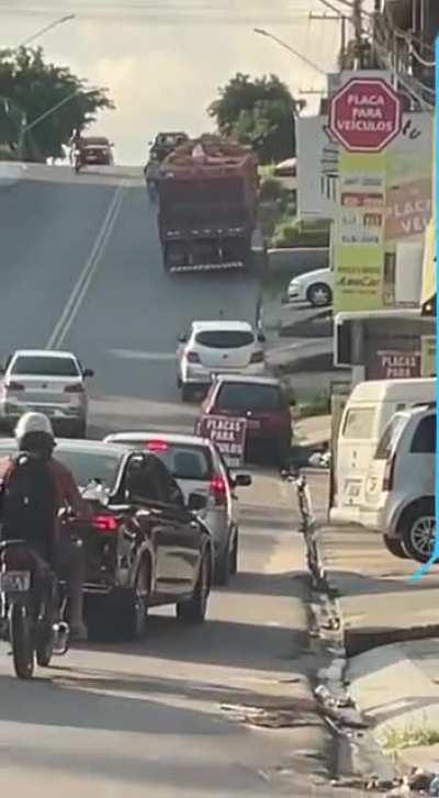 Drivers behind the truck predicted what was about to happen.