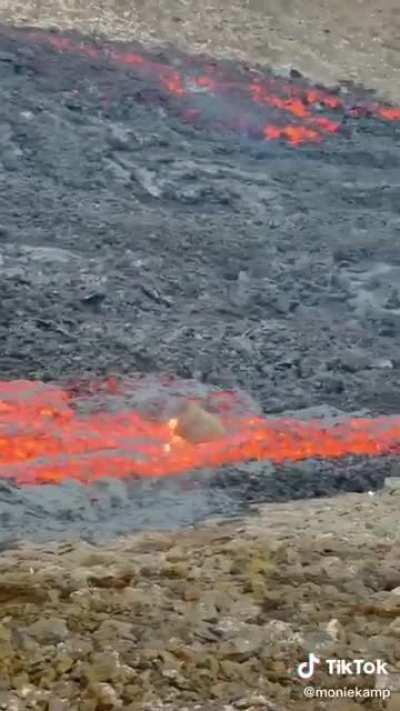What happens when a boulder rolls into lava?