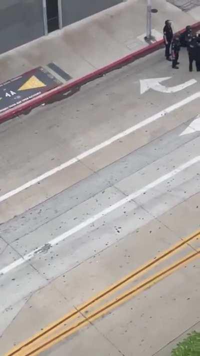 [LA]: Police tase woman lying on the ground multiple times