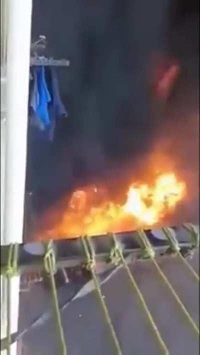 Overturned gasoline truck catches on fire in the middle of a crowd