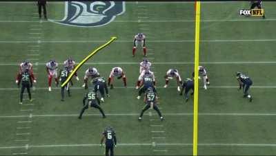 Bruce Irvin tackles Saquon Barkley using Daniel Jones